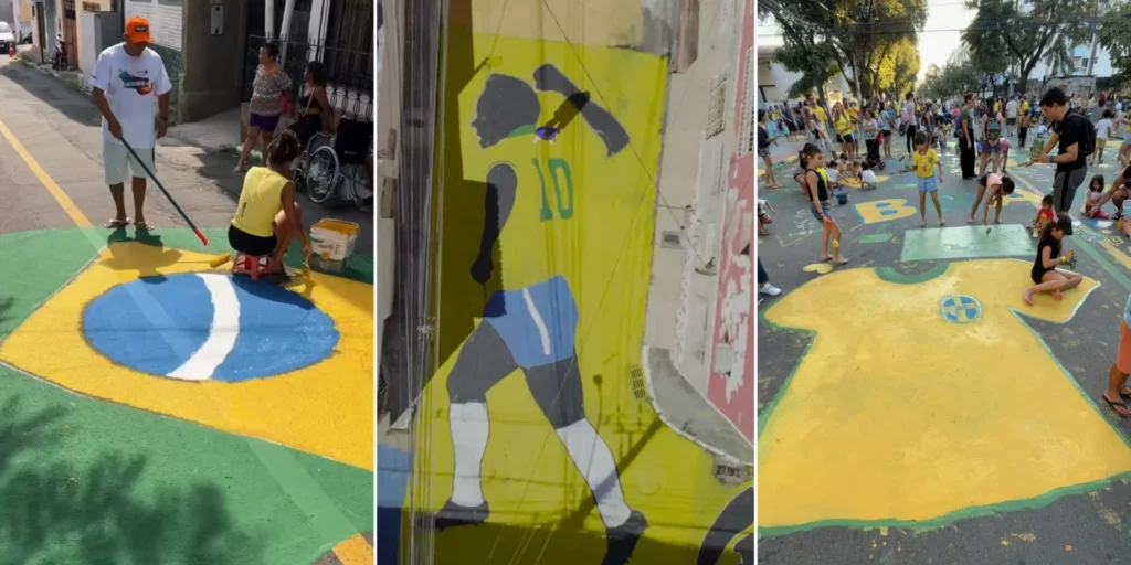Moradores pintando o asfalto das ruas de Vitória para a Copa do Mundo de 2026 com o apoio da Politintas.